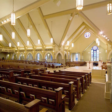 Clean retail store with shoes on the wall